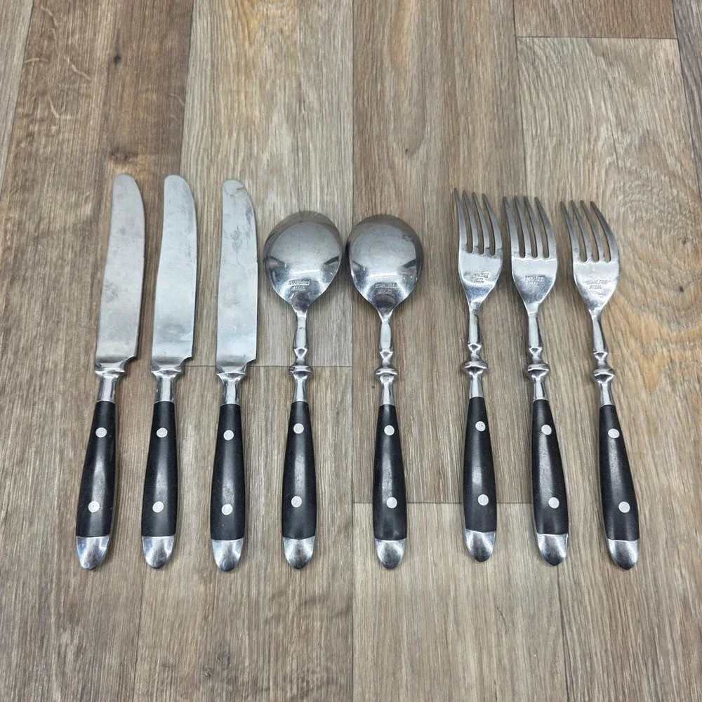 Vtg 8 Pc Stainless Steel Flatware Set Black Rivet Handles Knives Forks Spoons
